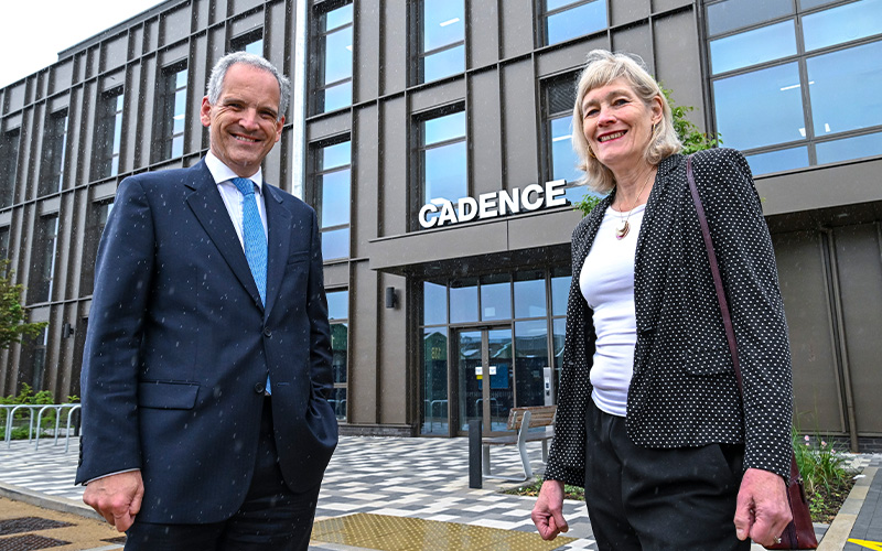 Photo of Dr Fran Crawford and Nicholas Bewes in front of Cadence Building 